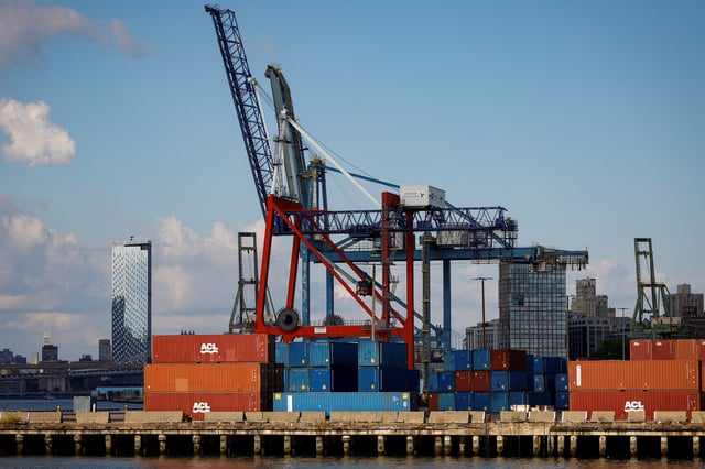 Shipping containers are stacked on a pier at the Red Hook Terminal in Brooklyn, New York, U.S., September 20, 2024.  REUTERS/Brendan McDermid/File Photo