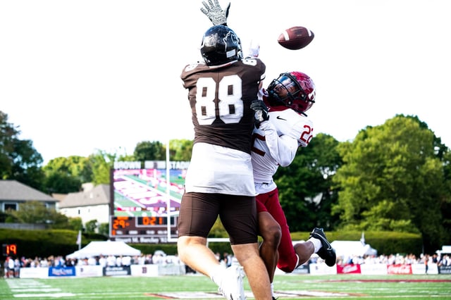 Mark Mahoney (88) goes up to snare a TD pass in the final moments of Saturday's game vs. Harvard.