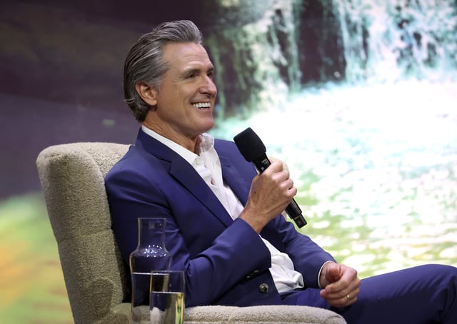 California Gov. Gavin Newsom talks onstage.