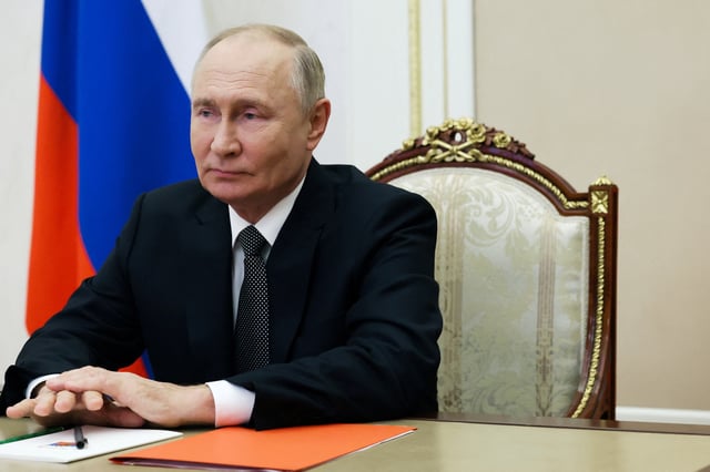Russian President Vladimir Putin chairs a meeting with members of the Security Council via video link in Moscow, Russia September 27, 2024. Sputnik/Sergei Ilyin/Kremlin via REUTERS/File Photo
