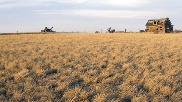 FILE - An abandoned farm is shown on the Fort Peck Reservation, March 19, 2007, near Poplar, Montana. (AP Photo/Matthew Brown)