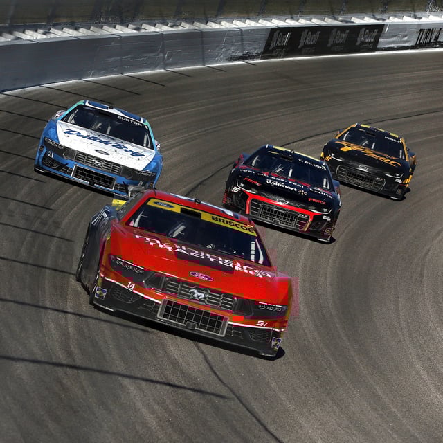 Chase Briscoe, driver of the #14 Mahindra Tractors Ford, drives during the NASCAR Cup Series Hollywood Casino 400 Presented by ESPN BET at Kansas Speedway on September 29, 2024 in Kansas City, Kansas. 23XI Racing and Front Row Motorsports file a lawsuit against NASCAR.