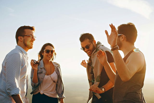 Four friends having fun together. Image Credit: Helena Lopes, Pexels