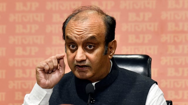 BJP MP Dr Sudhanshu Trivedi addresses a press conference at party headquarters.