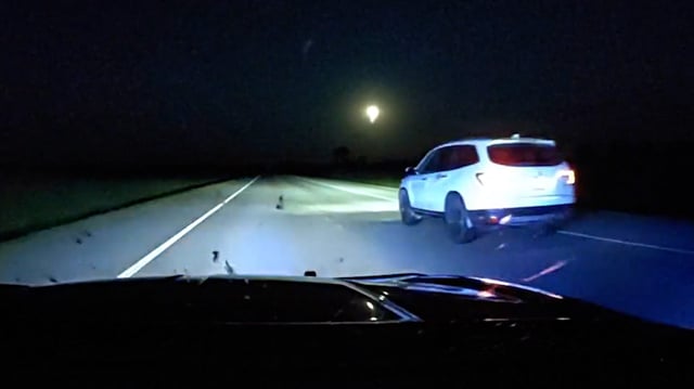 Police work together to save teenager in runaway car.