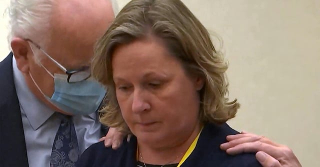 In this screen grab from video, former Brooklyn Center Police Officer Kim Potter stands with defense attorney Earl Gray, as the verdict is read Thursday, Dec.,23, 2021 at the Hennepin County Courthouse in Minneapolis, Minn. Jurors on Thursday convicted Potter of two manslaughter charges in the killing of Daunte Wright, a Black motorist she shot during a traffic stop after she said she confused her gun for her Taser.(Court TV via AP)