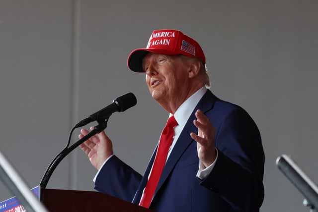 Republican presidential nominee and former U.S. President Donald Trump gestures as he speaks during a rally in Juneau, Wisconsin, U.S., October 6, 2024. REUTERS/Brendan McDermid