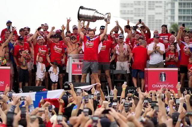 Jun 30, 2024; Fort Lauderdale, Florida, USA; Florida Panthers center Aleksander Barkov (16) raises the cup during the Stanley Cup victory parade and celebration. Mandatory Credit: Jim Rassol-USA TODAY Sports/File Photo