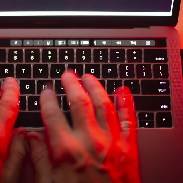 A man uses a computer keyboard in Toronto in a Sunday, Oct. 9, 2023, photo illustration. THE CANADIAN PRESS/Graeme Roy