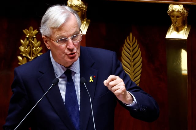 French Prime Minister Michel Barnier delivers a speech during a censure motion debate filed by the alliance of left-wing parties the "Nouveau Front Populaire" (New Popular Front - NFP), after the questions to the government session at the National Assembly in Paris, France, October 8, 2024. REUTERS/Stephanie Lecocq