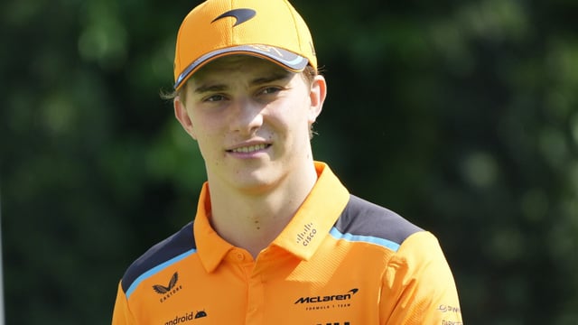 McLaren driver Oscar Piastri of Australia arrives before the first practices during the Singapore Formula One Grand Prix at the Marina Bay circuit in Singapore, Friday, Sept. 15, 2023. (AP Photo/Vincent Thian)