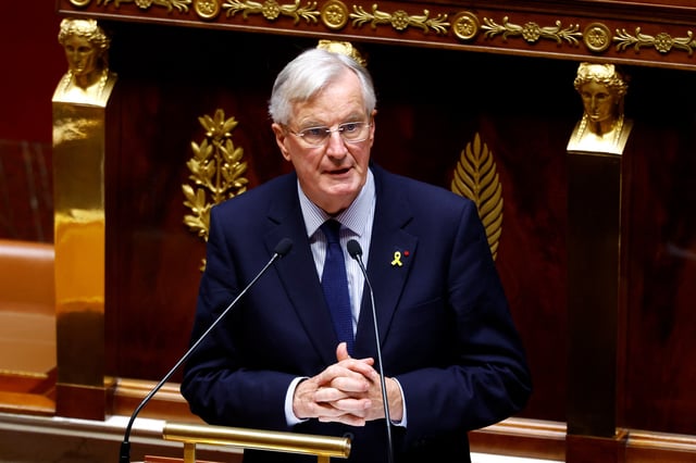 French Prime Minister Michel Barnier delivers a speech during a censure motion debate filed by the alliance of left-wing parties the "Nouveau Front Populaire" (New Popular Front - NFP), after the questions to the government session at the National Assembly in Paris, France, October 8, 2024. REUTERS/Stephanie Lecocq/File Photo
