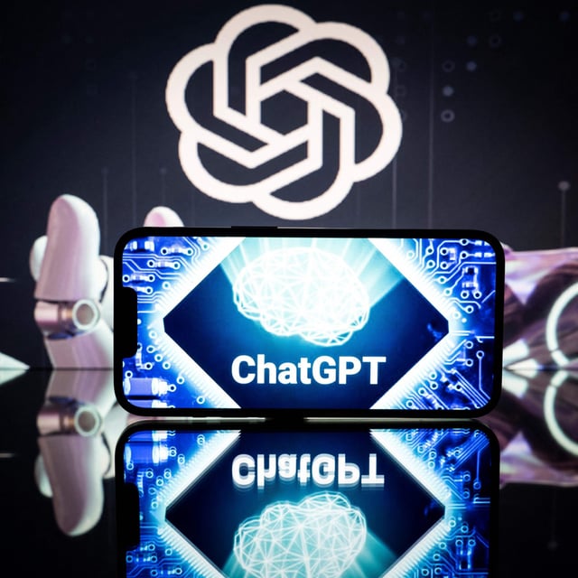 This picture taken on January 23, 2023 in Toulouse, southwestern France, shows screens displaying the logos of OpenAI and ChatGPT. ChatGPT is a conversational artificial intelligence software application developed by OpenAI.