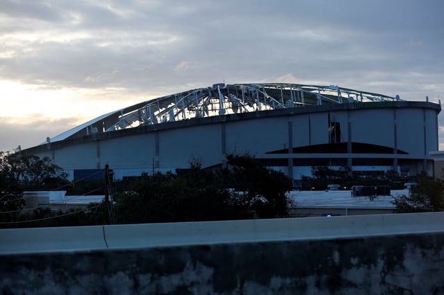 View of the damaged roof of Tropicana Field stadium, the home of Major League Baseball's Tampa Bay Rays, after Hurricane Milton made landfall, in downtown St. Petersburg, Florida, U.S. October 10, 2024.  REUTERS/Octavio Jones