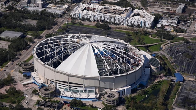 The destroyed roof of the Tropicana Field is seen in the aftermath of Hurricane Milton, Thursday, Oct. 10, 2024, in St. Petersburg, Fla. (AP Photo/Gerald Herbert)