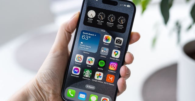 The iPhone 15 Pro in hand.