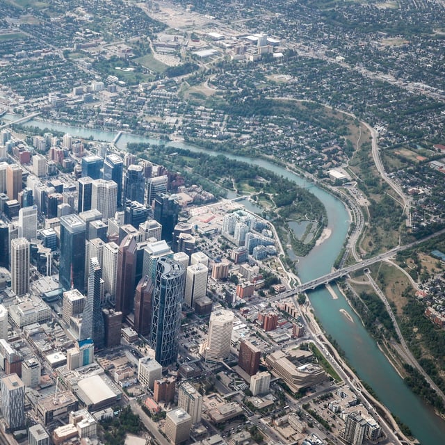 Downtown Calgary and the Bow River are seen from the air on Wednesday, May 31, 2023. Calgary residents can now turn on their sprinklers for longer as the city swelters under an extreme heat warning. THE CANADIAN PRESS/Jeff McIntosh