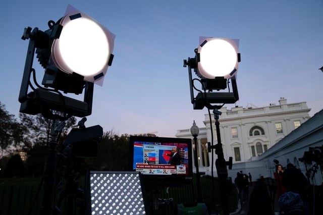 FILE – Media organizations set up outside the White House, Friday, Nov. 6, 2020, in Washington. (AP Photo/Evan Vucci, File)