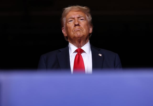 RENO, NEVADA - OCTOBER 11: Republican presidential nominee, former U.S. President Donald Trump, greets supporters during a campaign rally at the Grand Sierra Resort on October 11, 2024 in Reno, Nevada. With 25 days to go until election day, former President Donald Trump is campaigning in Nevada and Colorado.  (Photo by Justin Sullivan/Getty Images)