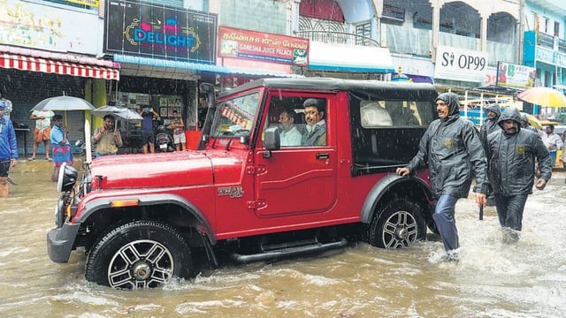 Tamil Nadu chief minister MK Stalin inspects a waterlogged area amid rain, at Pattalam in Chennai on Tuesday. (PTI)