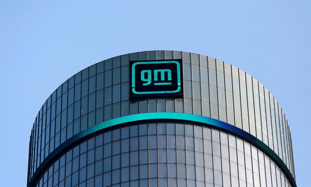 The new GM logo is seen on the facade of the General Motors headquarters in Detroit, Michigan, U.S., March 16, 2021. .  REUTERS/Rebecca Cook/File Photo