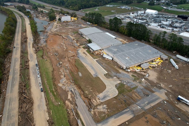  Damage caused by flooding from Hurricane Helene is seen around Impact Plastics in this aerial photo made Friday, Oct. 4, 2024, in Erwin, Tenn. (AP Photo/Jeff Roberson)
