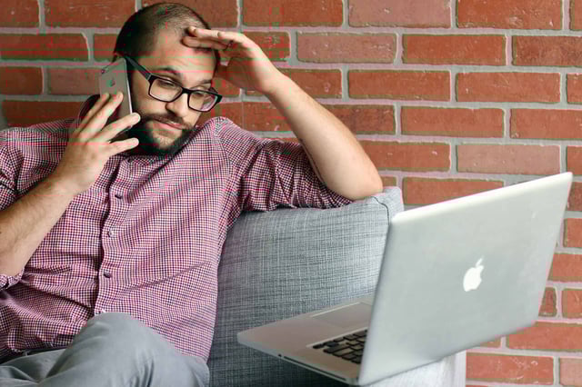 frustrated man on phone