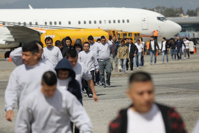 Immigrants deported from the United States arrive in Guatemala City on an ICE deportation flight on February 9, 2017.