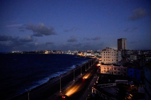 Cars drive on Havana's seafront boulevard Malecon as the country's electrical grid collapsed again on Sunday, according to Cuba's energy and mines ministry, in the latest setback to the government's efforts to restore power to the island, in Havana, Cuba October 20, 2024. REUTERS/Norlys Perez
