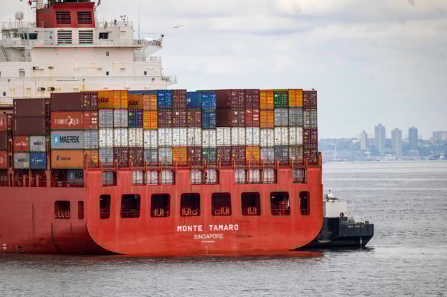 A cargo ship sits anchored in New York Harbor as it waits for the Port of Newark to re-open, on Oct. 2, 2024 in Staten Island, N.Y.