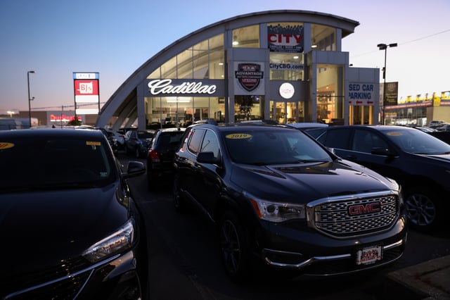 Vehicles of automobile brands belonging to General Motors Company are seen at a car dealership in Queens, New York, U.S., November 16, 2021. REUTERS/Andrew Kelly/File Photo