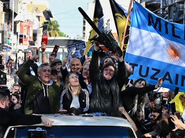 Argentine congressman and presidential candidate for the La Libertad Avanza Alliance, Javier Milei (C-R), waves a chainsaw during a campaign rally in San Martin, Buenos Aires province, Argentina, on September 25, 2023. (LUIS ROBAYO/AFP via Getty)