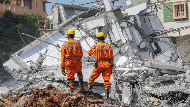 NDRF personnel during a rescue operation after an under-construction building collapsed in Bengaluru.