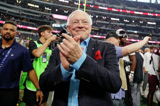 Dallas Cowboys owner and GM Jerry Jones applauds the Texas A&amp;M Aggies band after a game on Sept. 28, 2024, at AT&amp;T Stadium in Arlington, Texas.