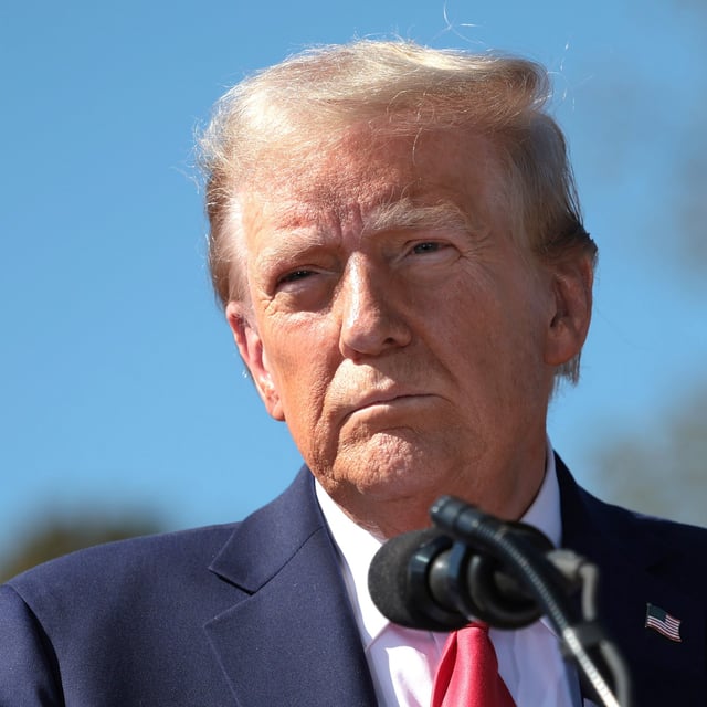 Republican presidential nominee, former U.S. President Donald Trump, delivers remarks as he visits a neighborhood affected by Hurricane Helene on October 21, 2024 in Swannanoa, North Carolina.