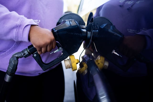 A driver refuels their vehicle at a Citgo gas station.