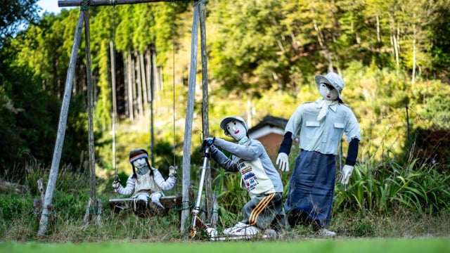 Silence pervades the air in Ichinono, where residents have handcrafted stuffed mannequins to create a semblance of a bustling society.