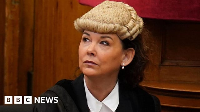 Lord Advocate Dorothy Bain KC, pictured in a court room wearing a black robe and wig
