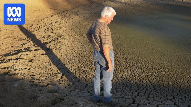 Northcliffe dairy farmer Wally Bettink standing in a cracking dry dam