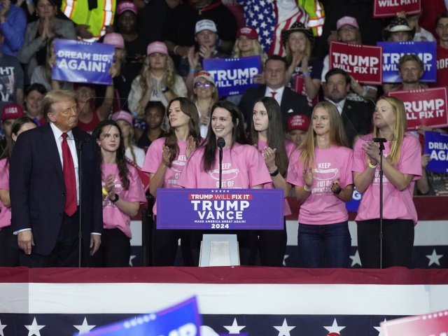 Lilly Mullens of the Roanoke College Swim Team, speaks at a campaign rally for Republican presidential nominee former President Donald Trump, Saturday Nov. 2, 2024, in Salem, Va. (AP Photo/Steve Helber)