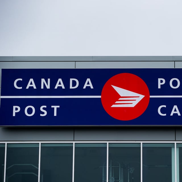 Canada Post says talks are continuing with the union that represents postal workers and neither side has given notice of a work stoppage. The Canada Post logo is seen on the outside the company's Pacific Processing Centre, in Richmond, B.C., on June 1, 2017. THE CANADIAN PRESS/Darryl Dyck