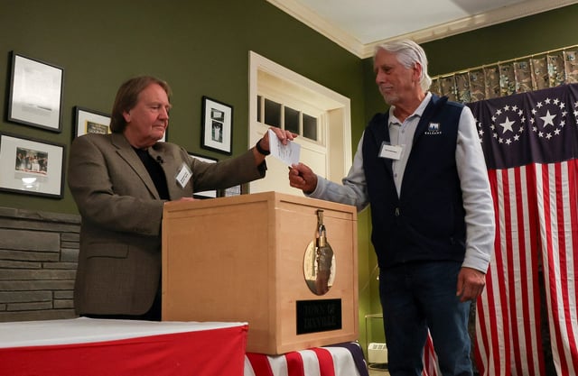 A man votes in the 2024 U.S. presidential election on Election Day in Dixville Notch, New Hampshire, U.S., November 5, 2024.