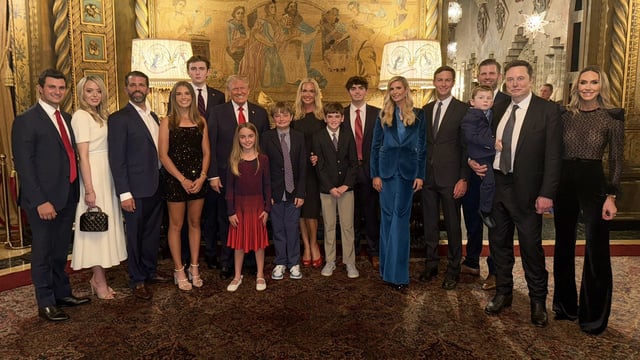 Elon Musk and his son X Æ A-Xii (second right) pose with Trump's family. 