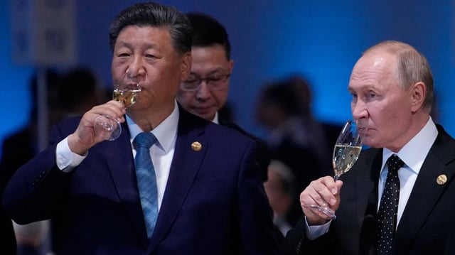 President Xi and President Putin at the Brics summit in Russia last month