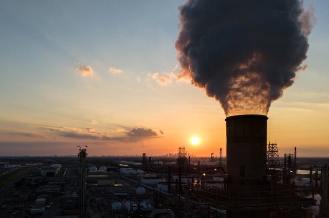 HOUSTON, TEXAS - JUNE 14: An aerial view of smoke from the LyondellBasell Houston refinery on June 14, 2024 in Houston, Texas. The International Energy Agency is predicting a major surplus of oil by the end of the decade as production continues rising and demand declines. The decline is in part due to the switch from gasoline to electric vehicles and renewable energy. The agency has reported that the world's oil production is expected to increase to approximately 114 million barrels per day by 2030. (Photo by Brandon Bell/Getty Images)
