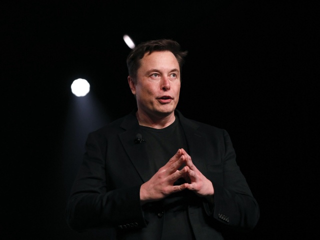 Elon Musk, co-founder and chief executive officer of Tesla Inc., speaks during an unveiling event for the Tesla Model Y crossover electric vehicle in Hawthorne, California, U.S., on Friday, March 15, 2019. Musk said the cheaper electric crossover sports utility vehicle (SUV) will be available from the spring of 2021. The vehicle's price will start at $39,000, a longer-range version will cost $47,000. Photographer: Patrick T. Fallon/Bloomberg