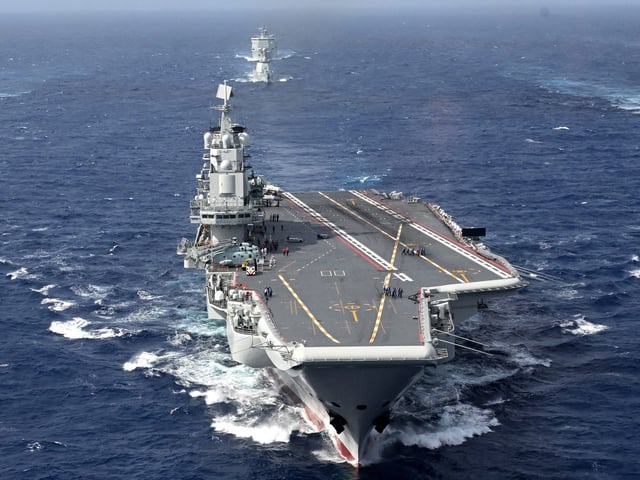 Dual-carrier group operations are aimed at enhancing China's naval capabilities and readiness, a spokesperson said.