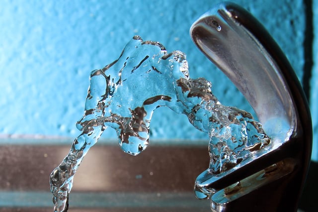 FILE - Water flows from a water fountain in Concord, N.H., on Friday, Jan. 7, 2011. (AP Photo/Jim Cole, File)