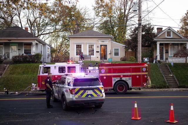 A firetruck and police car are parked on a street after an explosion in the Clifton Neighborhood in Louisville, Kentucky, on November 12, 2024. The explosion at the Givaudan Sense Colour facility has left at least eleven people injured, US media reported.