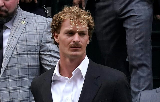US Marine veteran Daniel Penny is walked out of the New York Police Department 5th Precinct in Lower Manhattan, May 12, 2023.